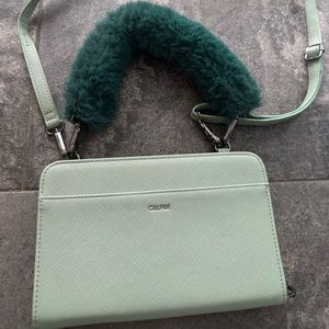 Calpak travel wallet with crossbody strap